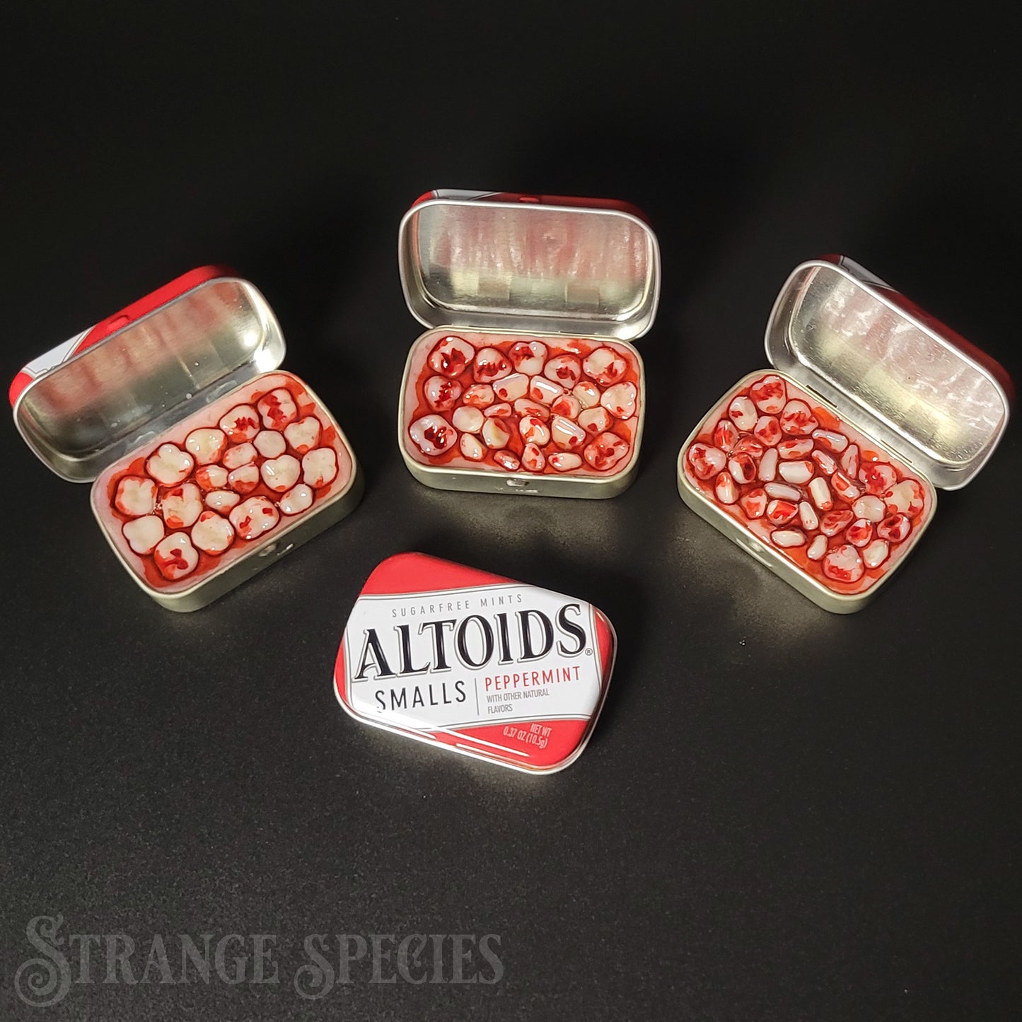 (Tiny) Tins Full of Teeth