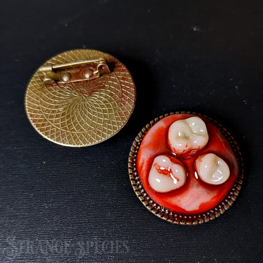 Bloody-Toothed Round Brooch